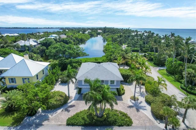 an aerial view of a house with a garden