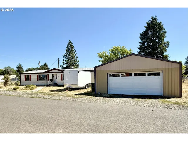 a house with trees in front of it