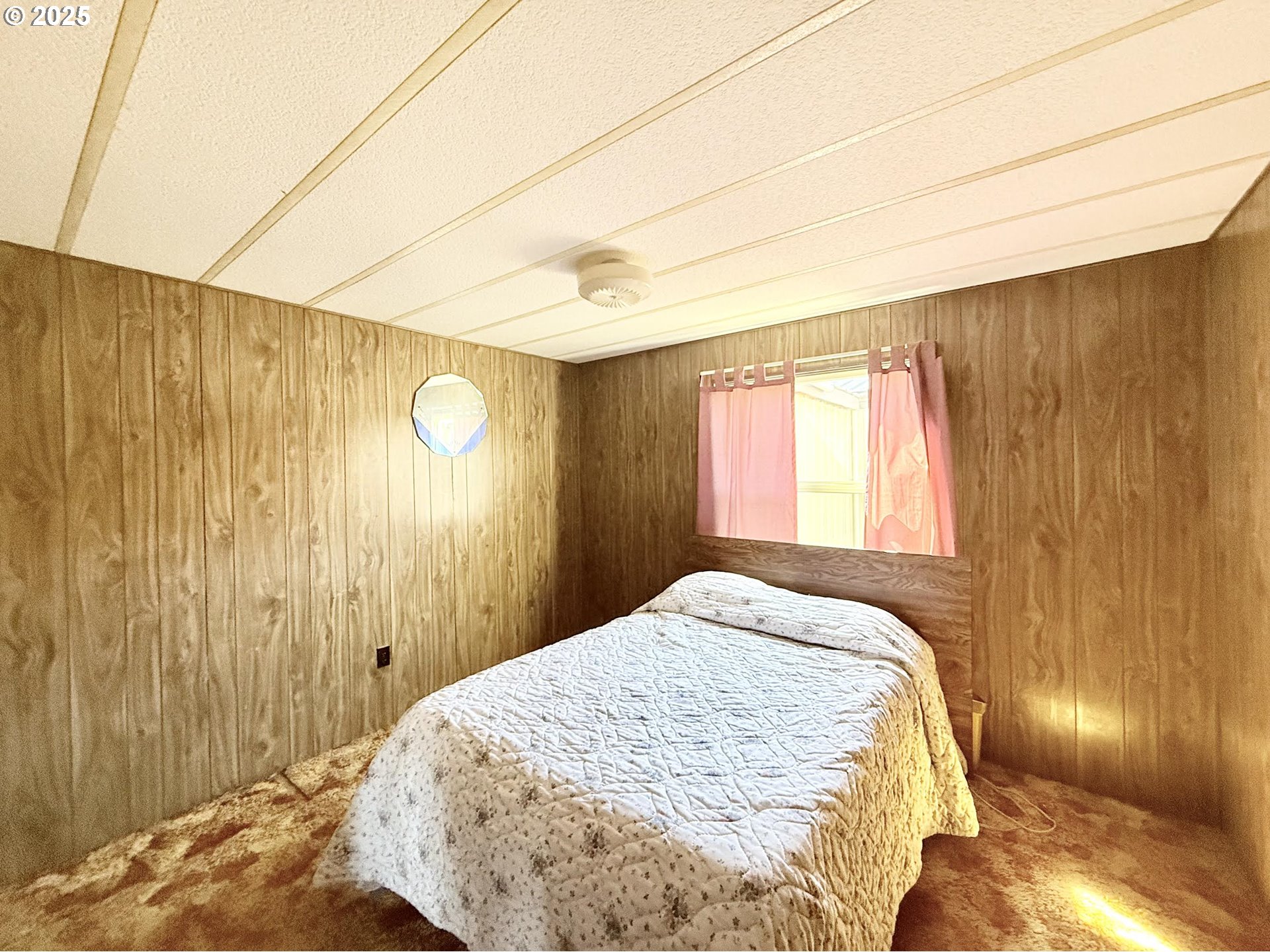 505 North 16th Avenue Elgin, OR 97827 - Photo 31 of 48 a bedroom with a bed and a window