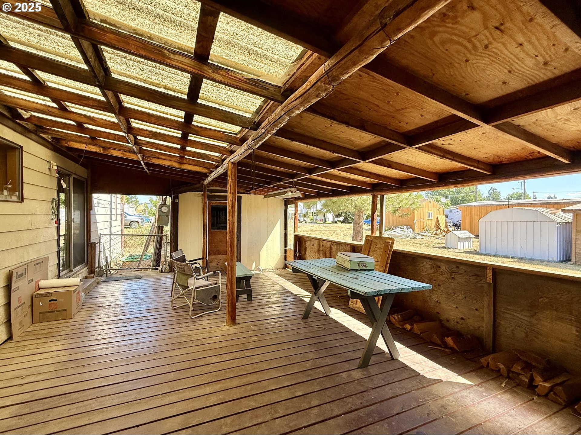 505 North 16th Avenue Elgin, OR 97827 - Photo 36 of 48 a view of a patio with table and chairs
