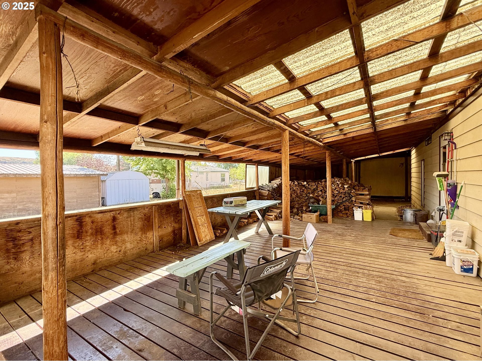 505 North 16th Avenue Elgin, OR 97827 - Photo 39 of 48 a view of a patio with table and chairs