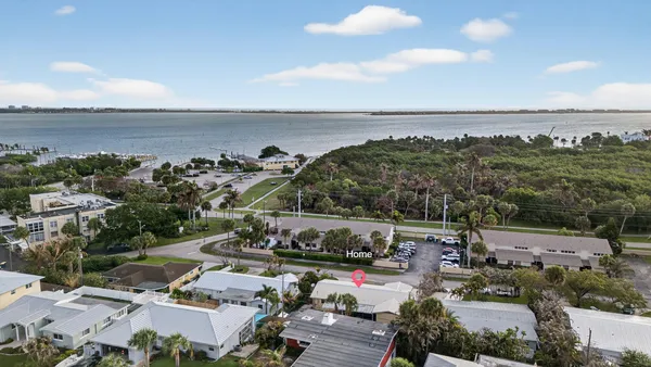 a aerial view of a house with a garden