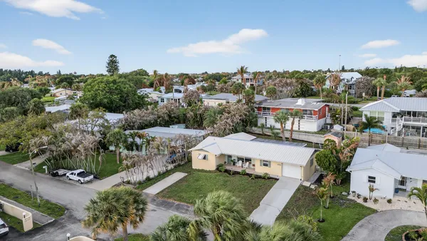 an aerial view of a city with lots of residential buildings