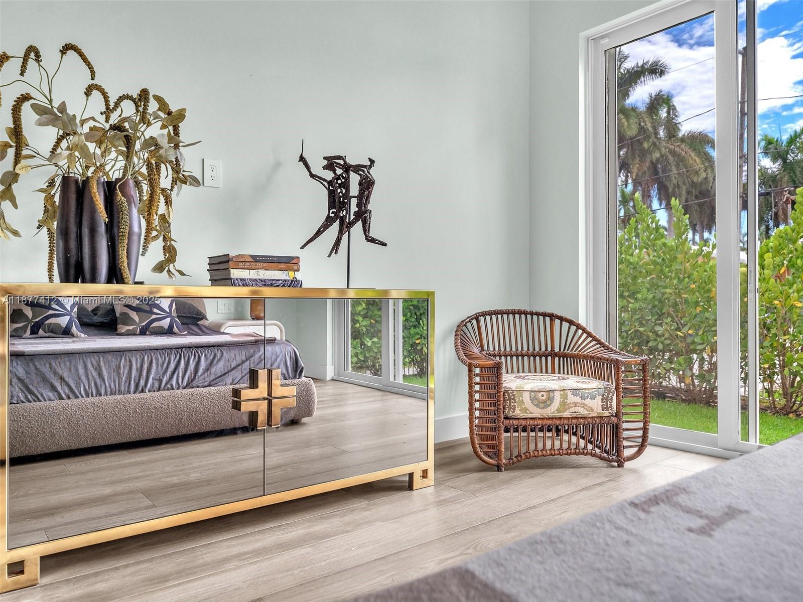 856 Tyler Street Hollywood, FL 33019 - Photo 30 of 52 a bedroom with furniture and a window