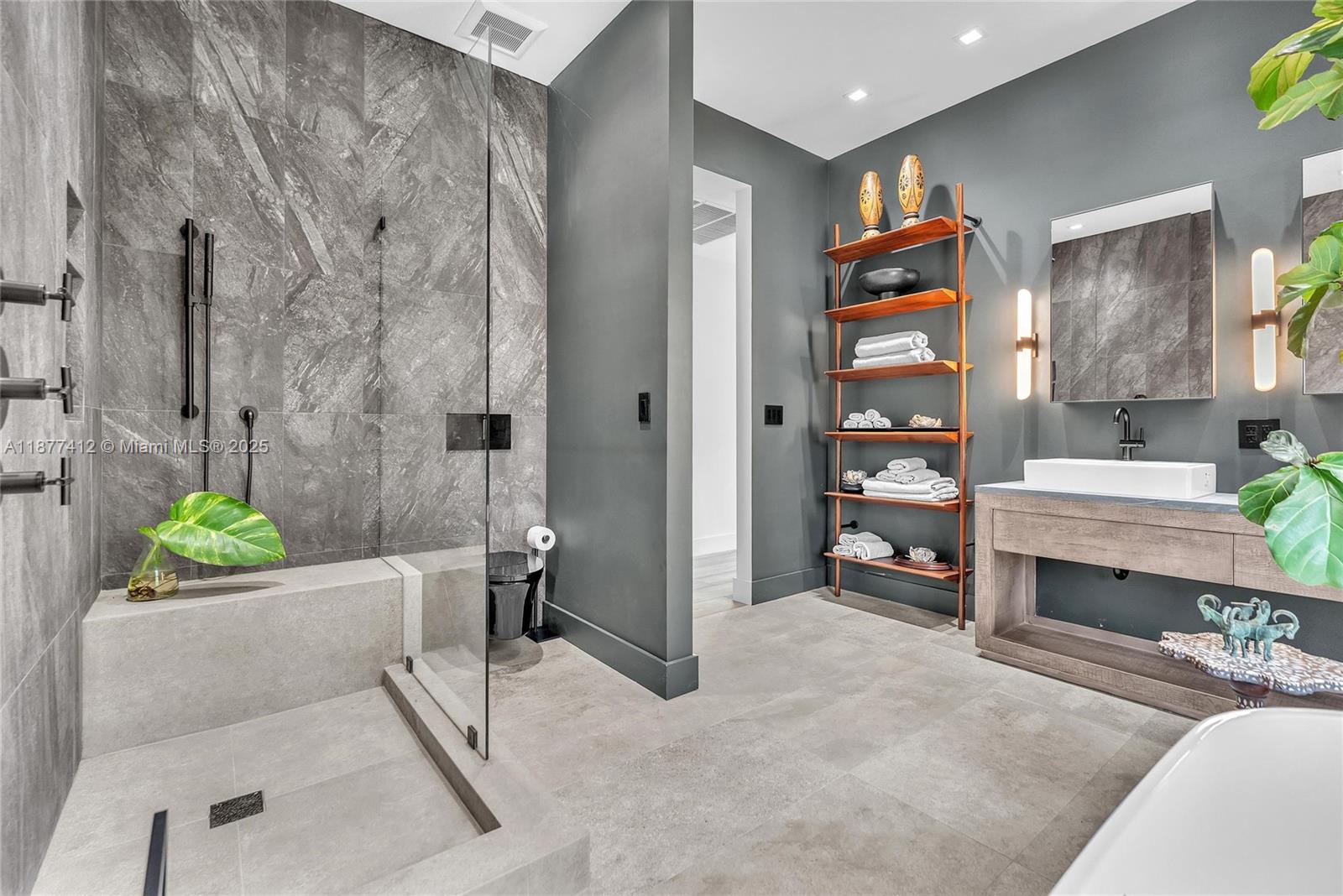 856 Tyler Street Hollywood, FL 33019 - Photo 31 of 52 a living room with furniture and a fireplace