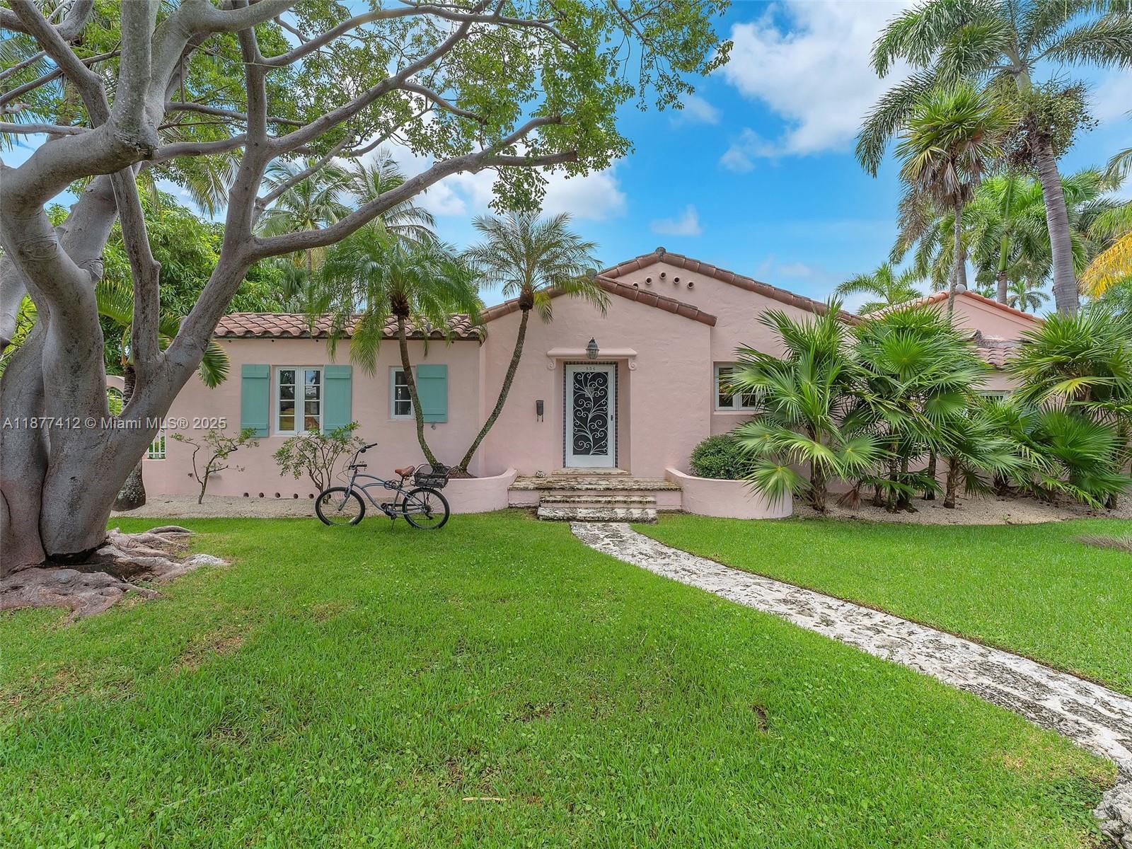 856 Tyler Street Hollywood, FL 33019 - Photo 4 of 52 a view of a house with a backyard