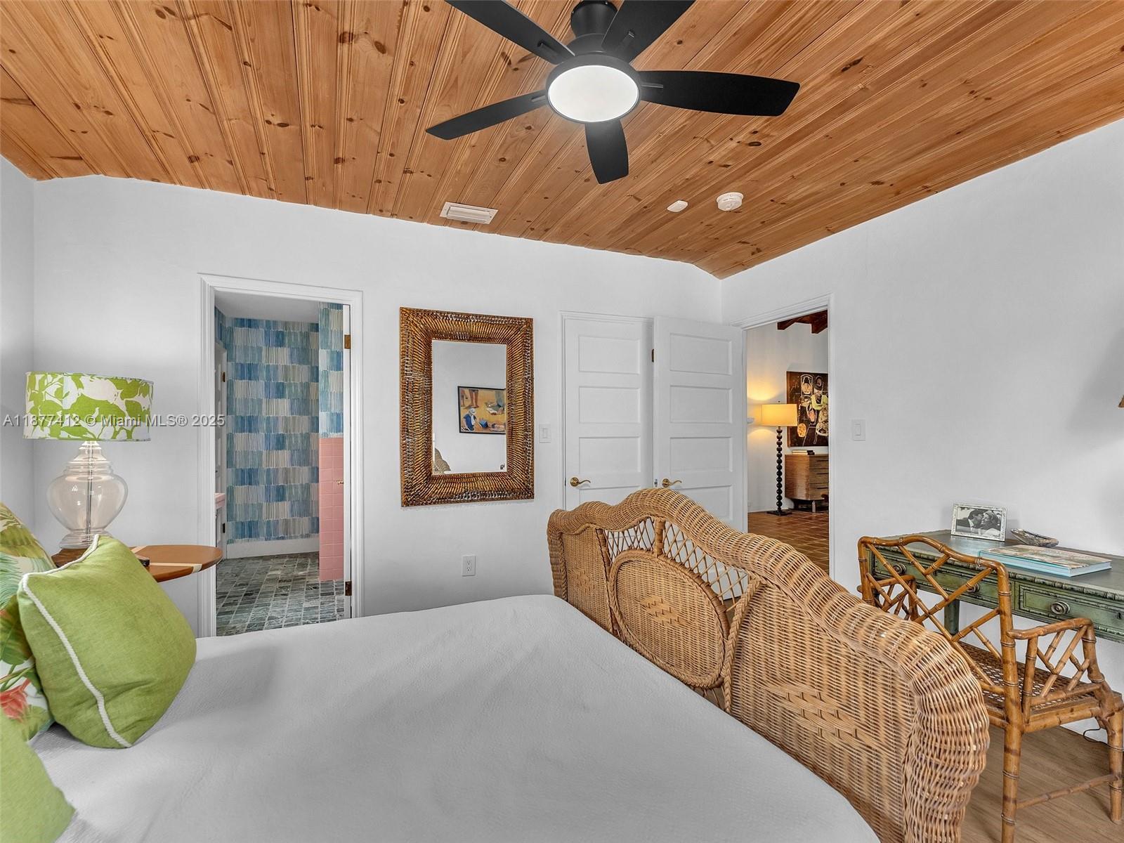 856 Tyler Street Hollywood, FL 33019 - Photo 44 of 52 a bedroom with furniture and a bed