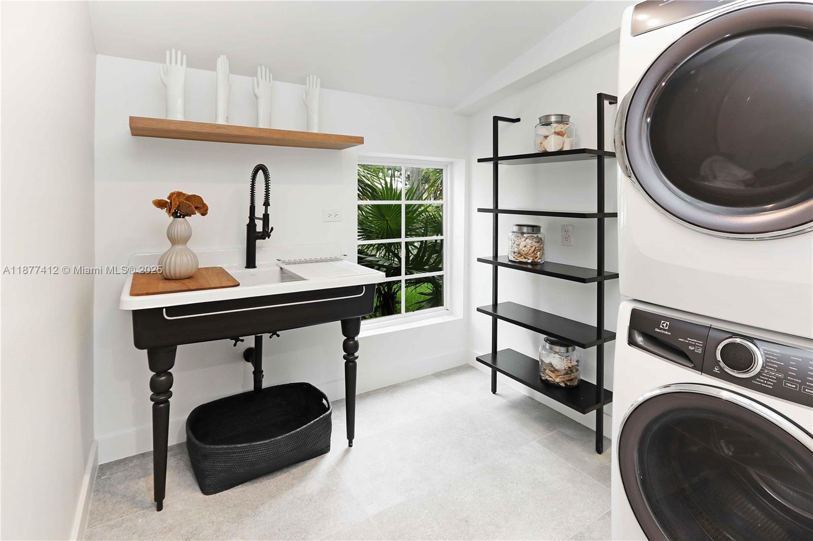 856 Tyler Street Hollywood, FL 33019 - Photo 49 of 52 a utility room with sink dryer and washer