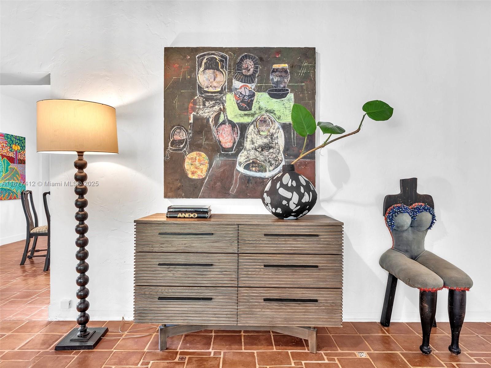 856 Tyler Street Hollywood, FL 33019 - Photo 7 of 52 a view of bedroom with a bed and lamp