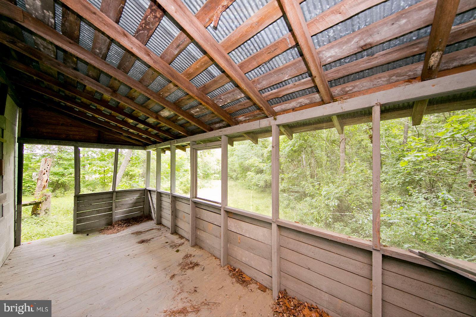 Green Spring Road Winchester, VA 22603 - Photo 17 of 27 Screened porch at cabin