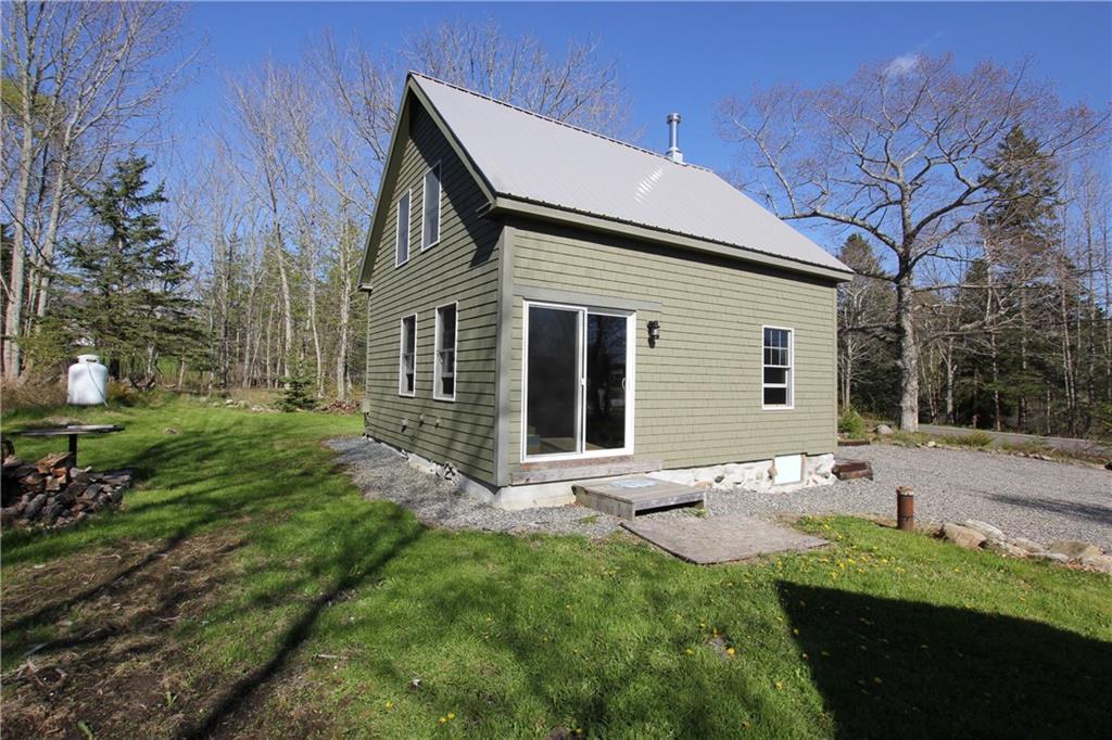 261 Sunset Road Deer Isle, ME 04627 - Photo 1 of 16 Side and Back of House