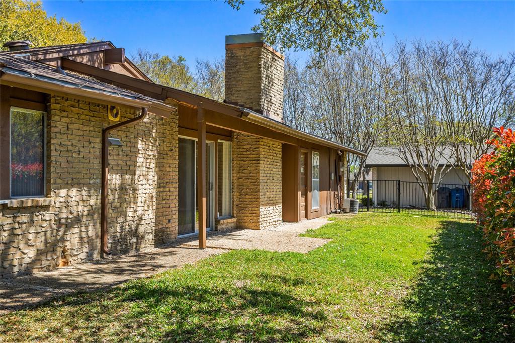 15721 Mapleview Circle Dallas, TX 75248 - Photo 30 of 40 front view of a house with a yard