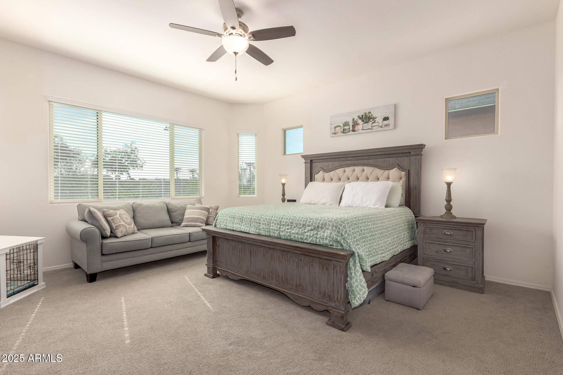 42851 West Mallard Road Maricopa, AZ 85138 - Photo 22 of 45 a bedroom with a bed couches and window