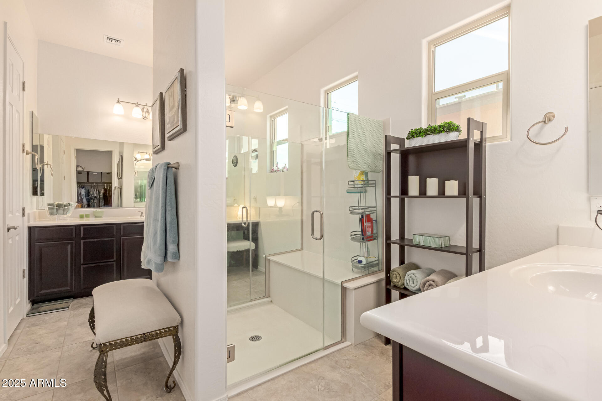 42851 West Mallard Road Maricopa, AZ 85138 - Photo 27 of 45 a bathroom with a tub sink and mirror