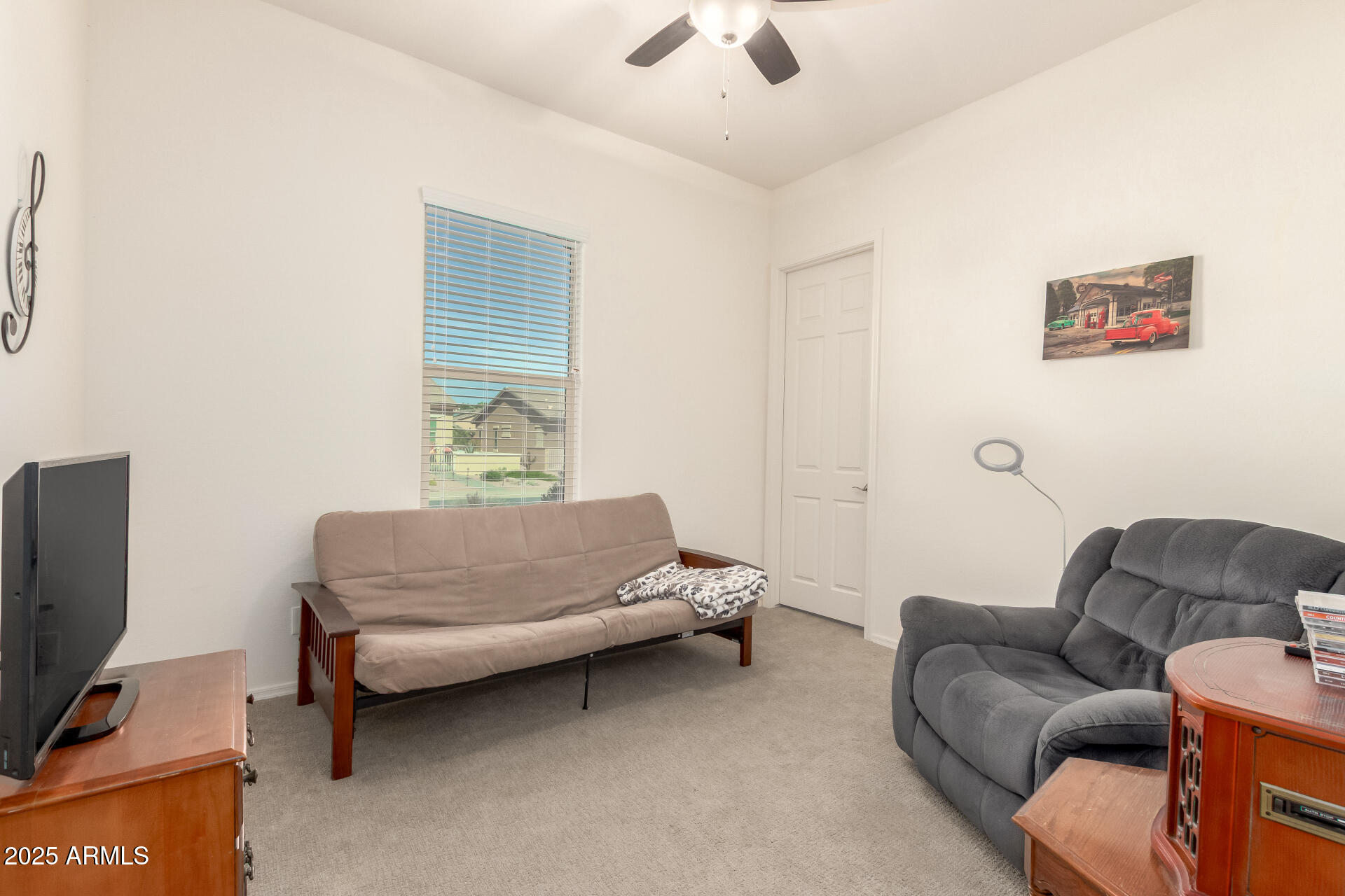 42851 West Mallard Road Maricopa, AZ 85138 - Photo 30 of 45 a living room with furniture and a couch
