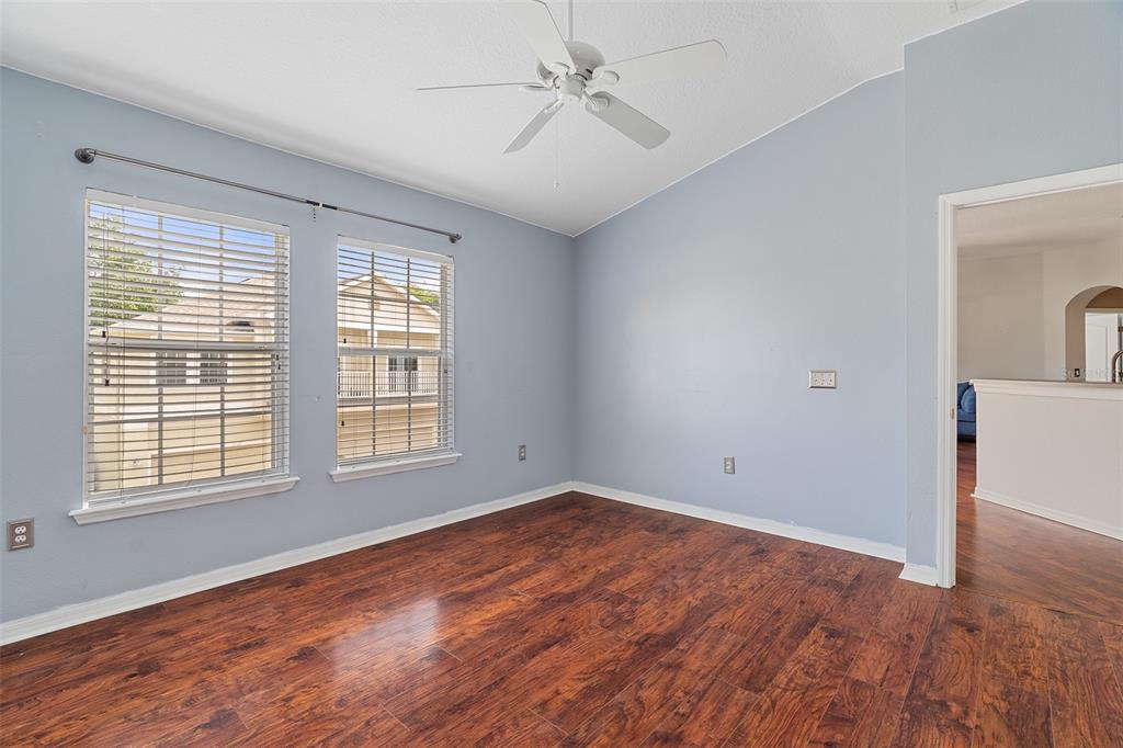 3555 Clay Brick Road, Unit 46A Harmony, FL 34773 - Photo 14 of 54 wooden floor in an empty room with a window