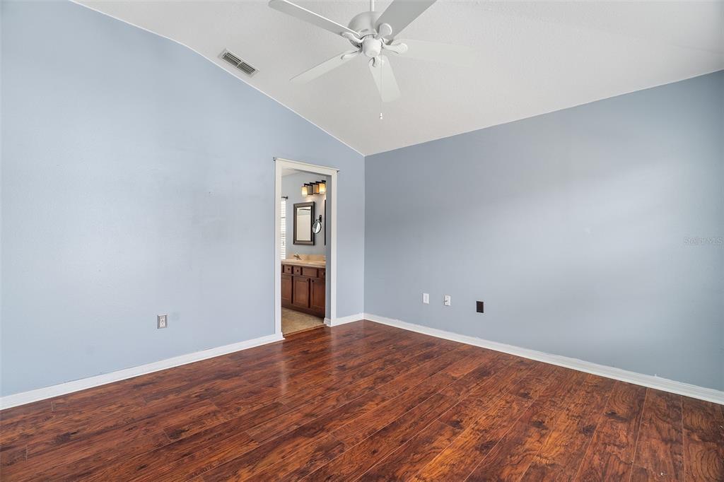 3555 Clay Brick Road, Unit 46A Harmony, FL 34773 - Photo 15 of 54 wooden floor in an empty room