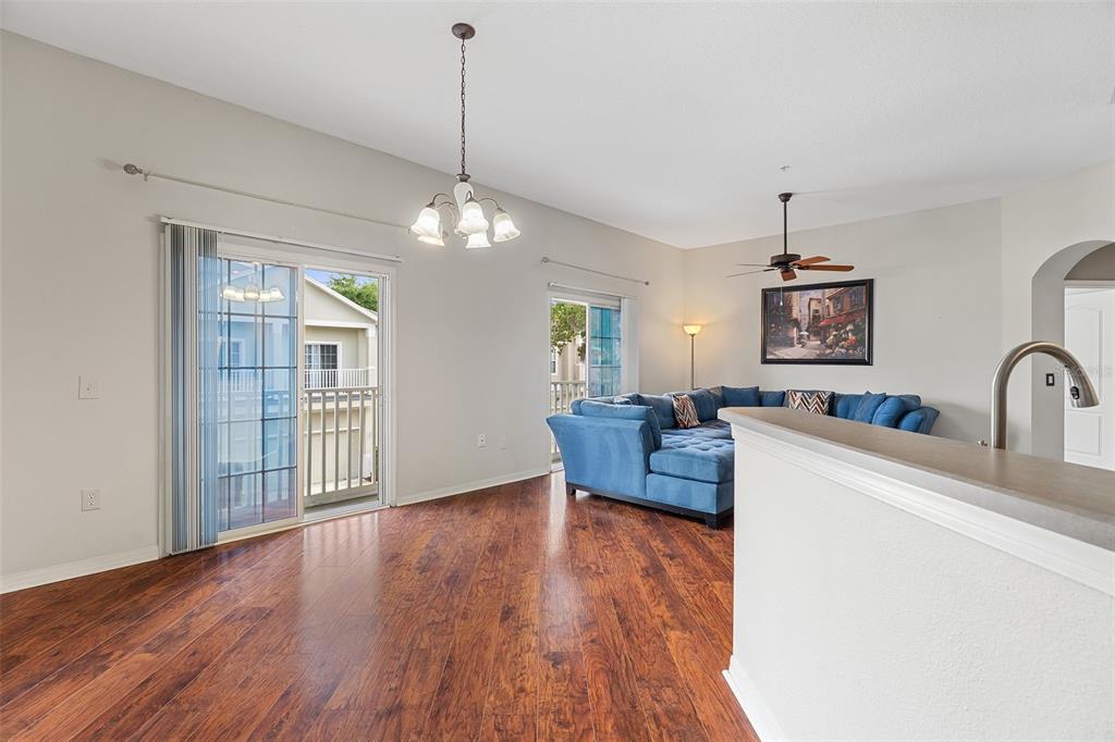 3555 Clay Brick Road, Unit 46A Harmony, FL 34773 - Photo 5 of 54 a living room with furniture and a wooden floor