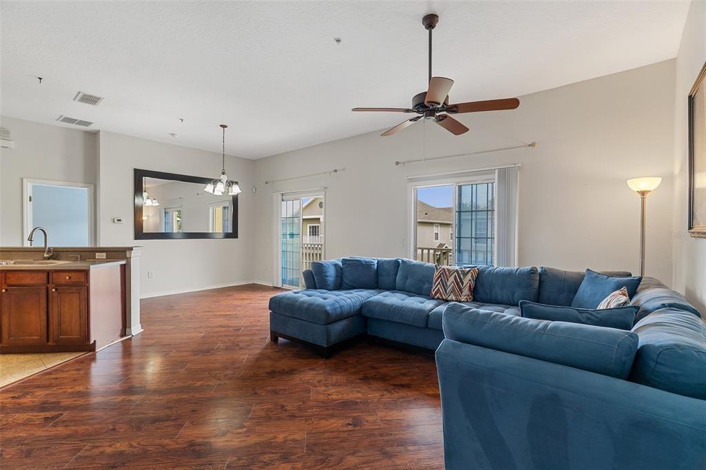 3555 Clay Brick Road, Unit 46A Harmony, FL 34773 - Photo 9 of 54 a living room with furniture and a wooden floor
