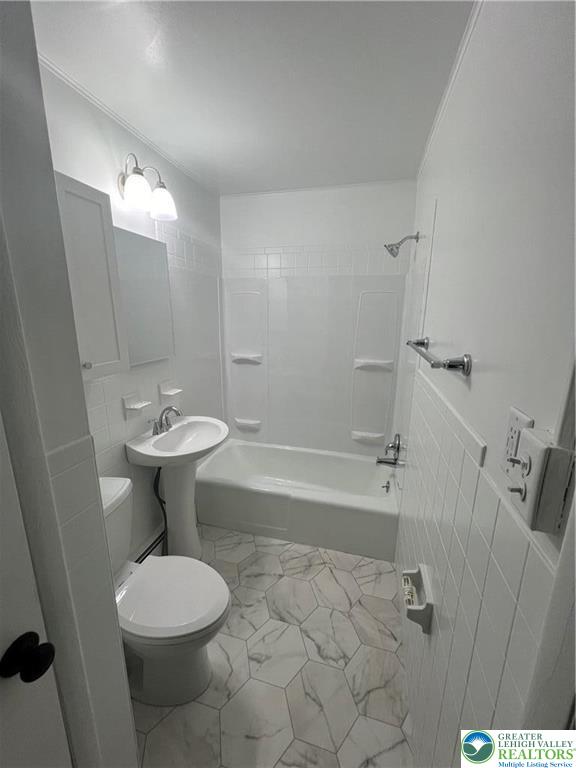 101 Center Street, Unit 1A Jim Thorpe, PA 18229 - Photo 14 of 18 a bathroom with a sink toilet and shower