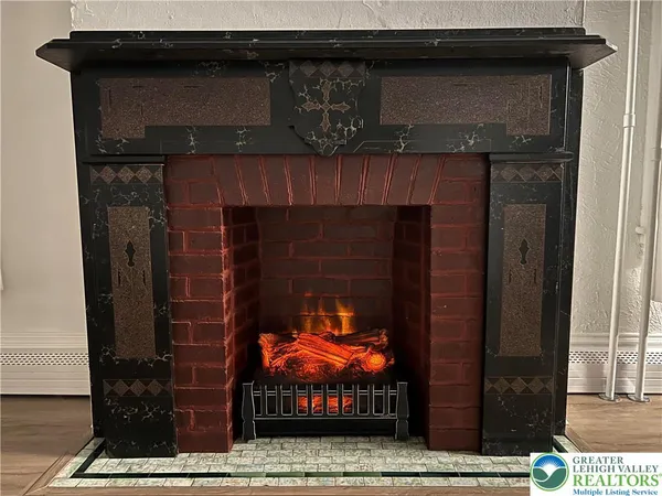 a view of a fireplace in the room