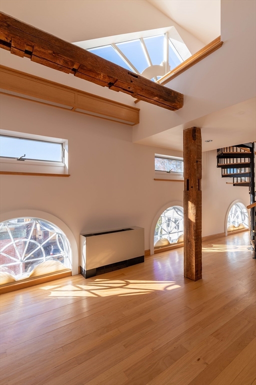 43 Center Street, Unit K Northampton, MA 01060 - Photo 4 of 18 a view of a room with wooden floor