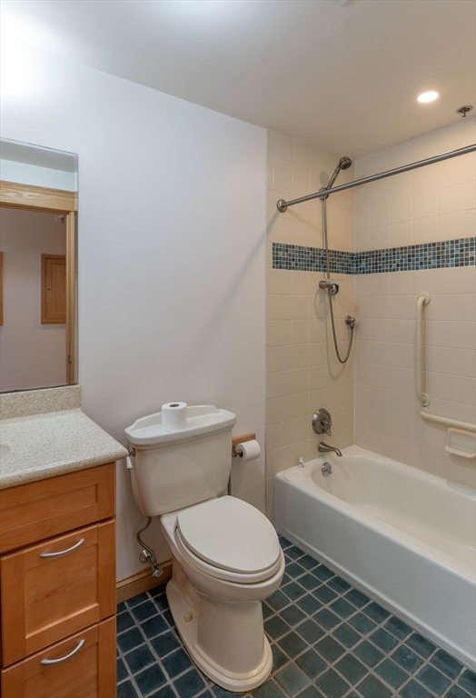 43 Center Street, Unit K Northampton, MA 01060 - Photo 10 of 18 a bathroom with a toilet and a shower