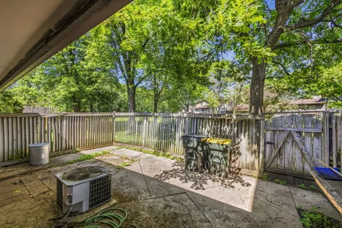 a patio view with a seating space
