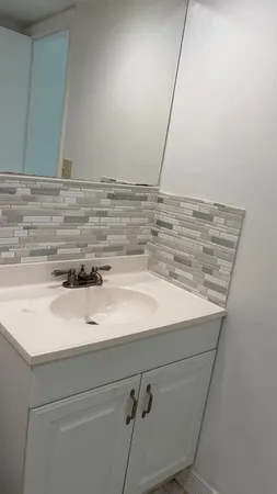 a close view of sink cabinets