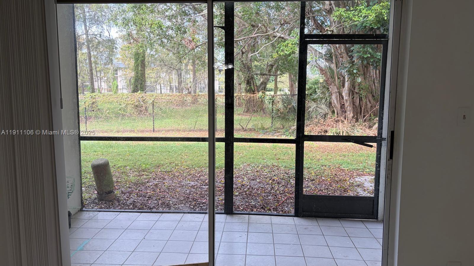7925 Fairview Drive, Unit 110 Tamarac, FL 33321 - Photo 23 of 34 a view of a room and window