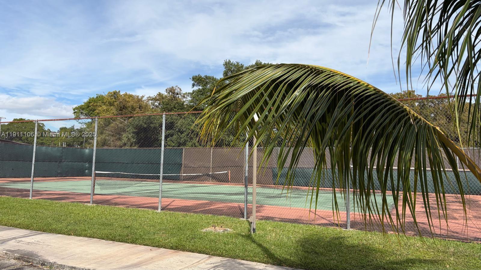 7925 Fairview Drive, Unit 110 Tamarac, FL 33321 - Photo 27 of 34 a view of a backyard and entertaining space