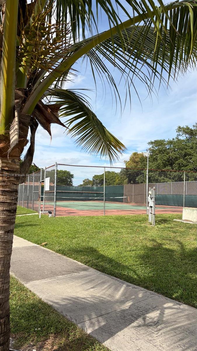 7925 Fairview Drive, Unit 110 Tamarac, FL 33321 - Photo 31 of 34 a view of a backyard with a garden