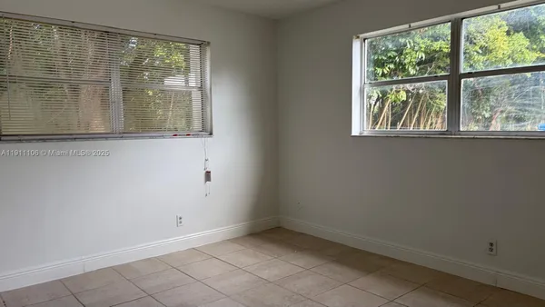 an empty room with a window