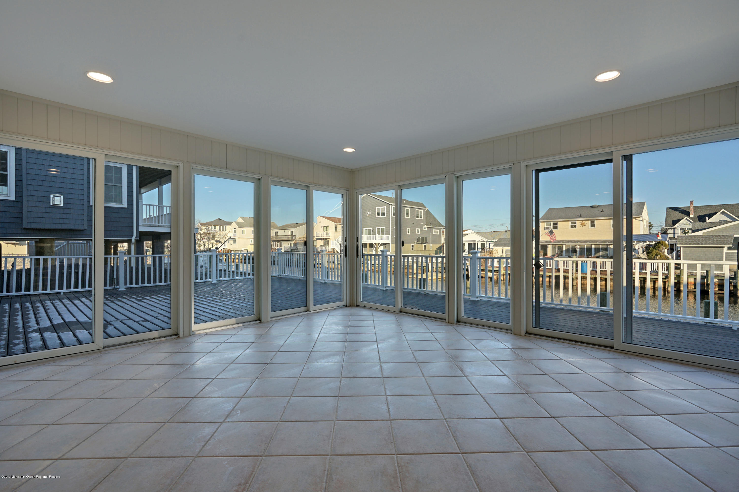 13 Neptune Road Toms River, NJ 08753 - Photo 22 of 50 Heated large glass laden family room