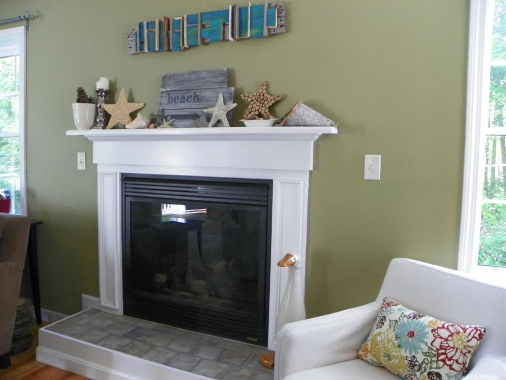 16 Port View Lane Kennebunk, ME 04043 - Photo 5 of 34 Attractive propane fireplace will...
