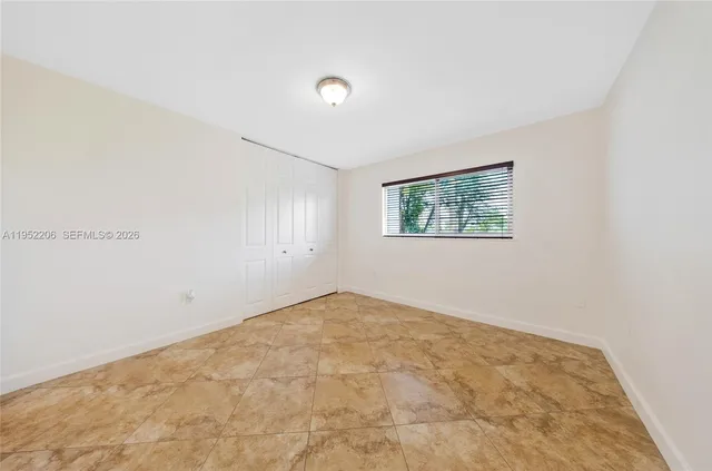 an empty room with a window