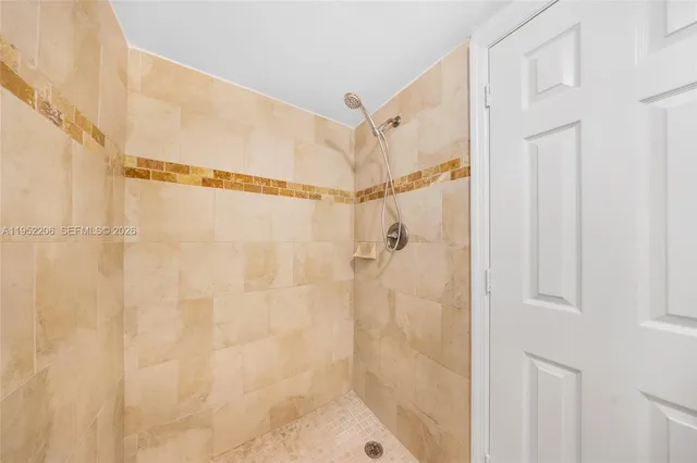 a view of livingroom with washer and dryer