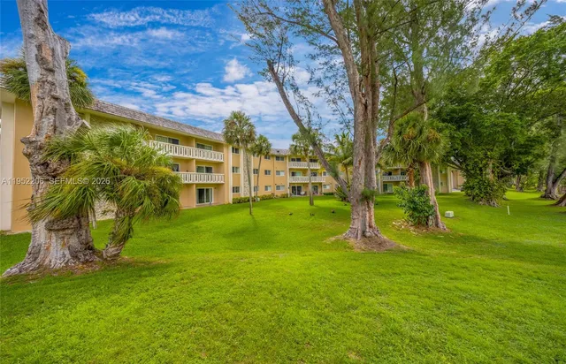 a view of a building with a garden