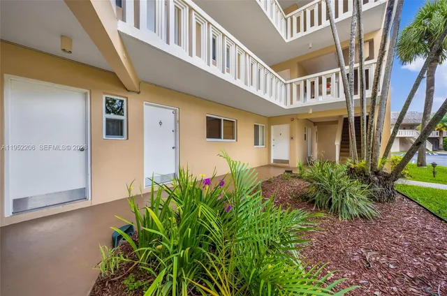 a view of street with tall buildings