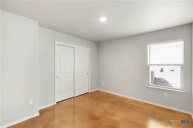 a big yard with table and chairs