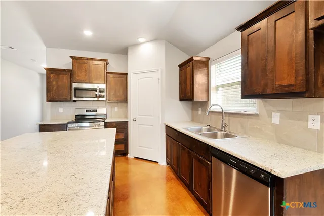 a view of a livingroom with a large window