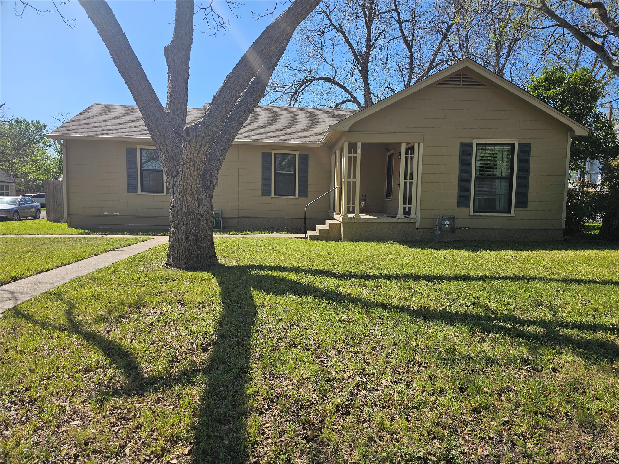 503 West 12th Street Taylor, TX 76574 - Photo 1 of 1 a front view of house with yard and green space