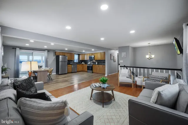 a living room with furniture and a table