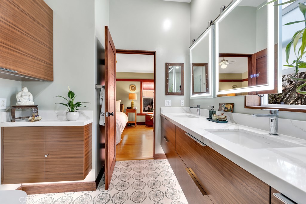 171 Comanche Topanga, CA 90290 - Photo 18 of 54 a spacious bathroom with a double vanity sink mirror and