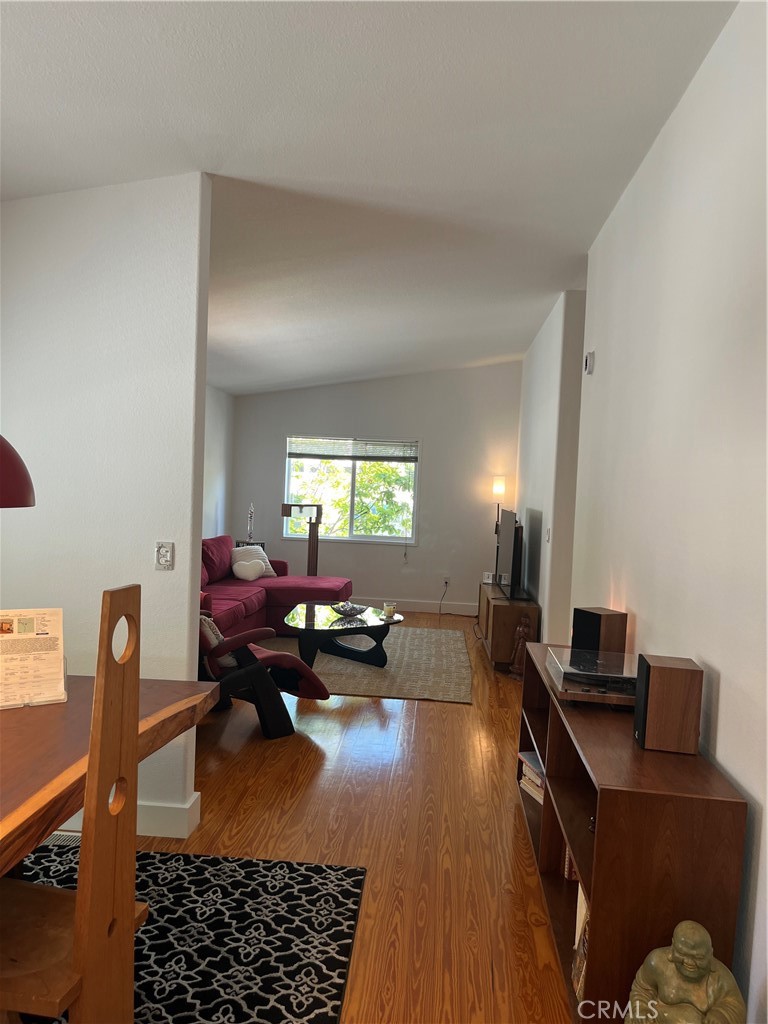 171 Comanche Topanga, CA 90290 - Photo 20 of 54 a living room with furniture and a window