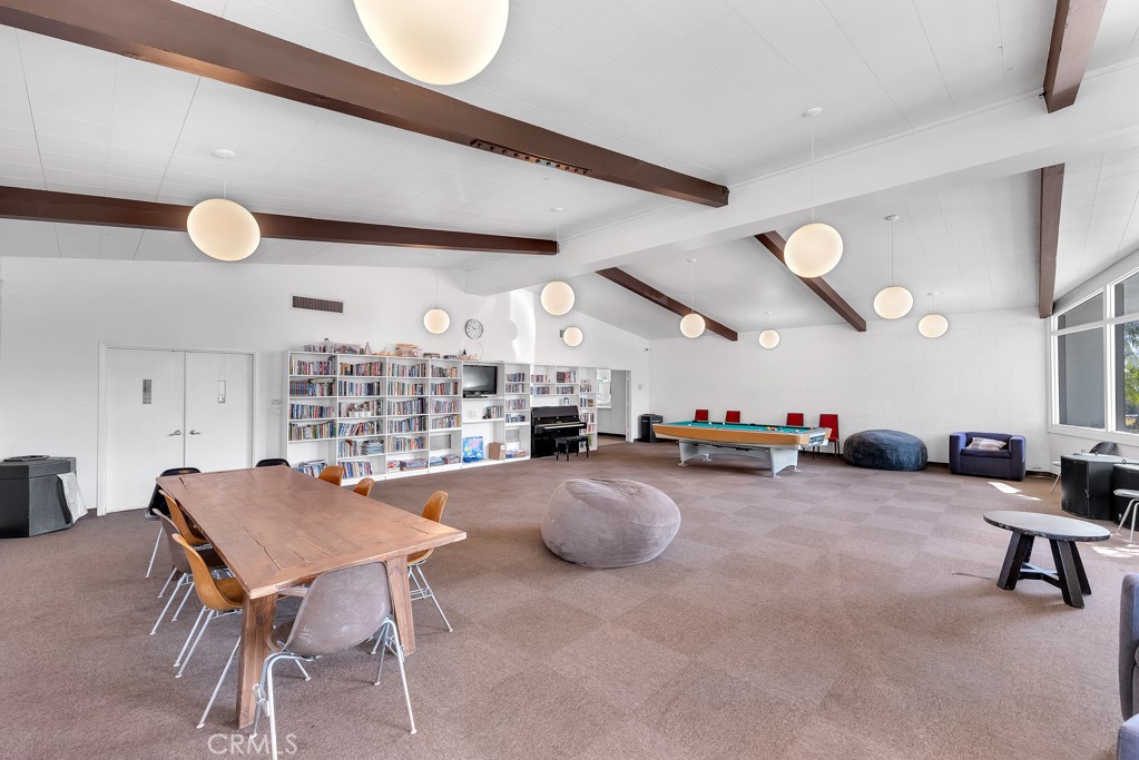 171 Comanche Topanga, CA 90290 - Photo 31 of 54 a room with furniture and a large window