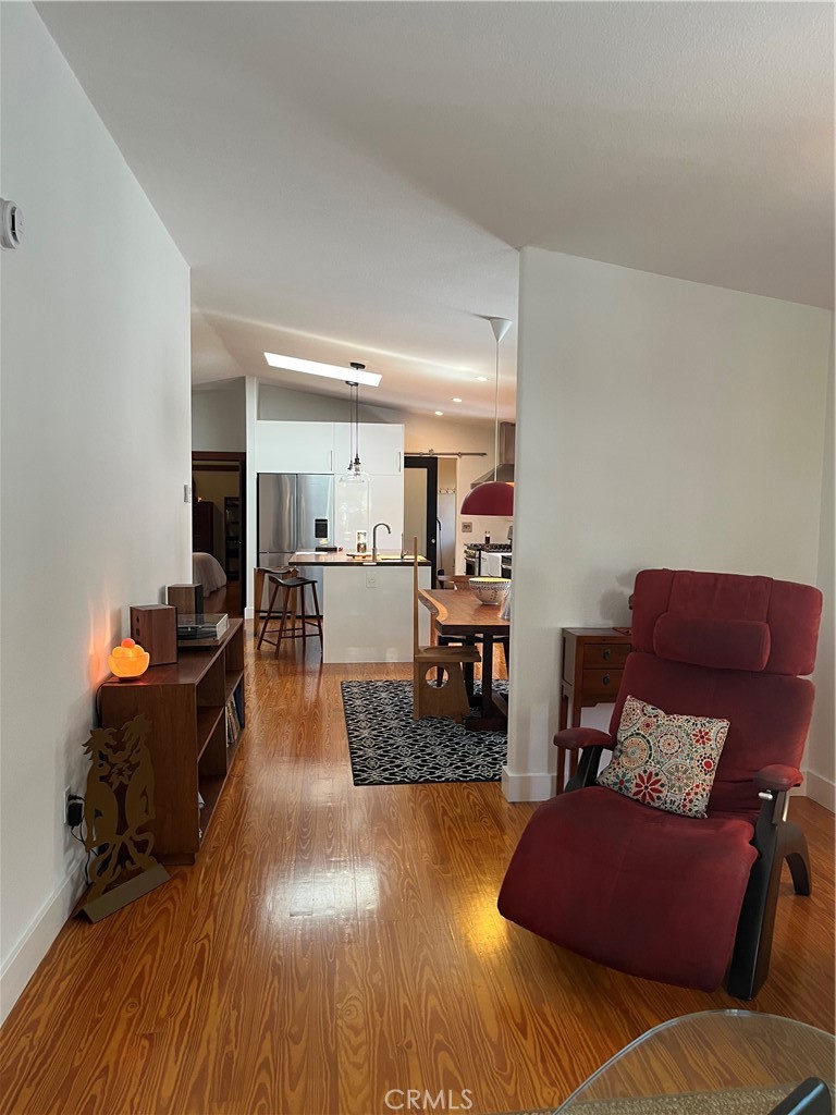171 Comanche Topanga, CA 90290 - Photo 6 of 54 a living room with furniture and a wooden floor