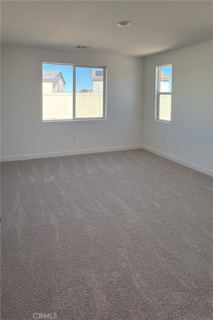 17454 Marion Mountain Hesperia, CA 92345 - Photo 10 of 11 an empty room that has a window