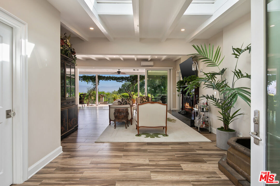 a view of living room and patio