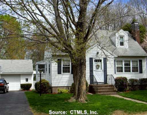 85 Bretton Road Manchester, CT 06042 - Photo 1 of 1 front view of a house with a yard